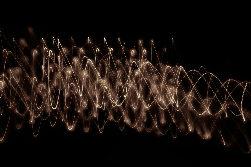 A mystical cosmic background with interconnected lights representing synchronicity in the universe.